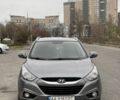Сірий Хендай іх35, об'ємом двигуна 2 л та пробігом 205 тис. км за 12499 $, фото 1 на Automoto.ua