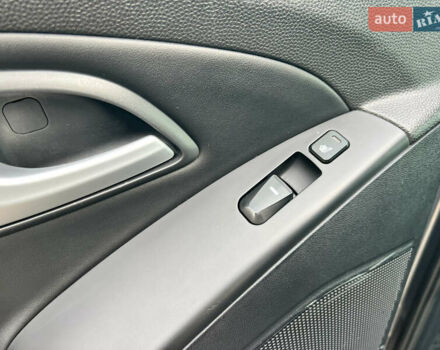 Сірий Хендай іх35, об'ємом двигуна 2 л та пробігом 178 тис. км за 11999 $, фото 19 на Automoto.ua