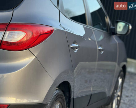 Сірий Хендай іх35, об'ємом двигуна 2 л та пробігом 230 тис. км за 14450 $, фото 23 на Automoto.ua