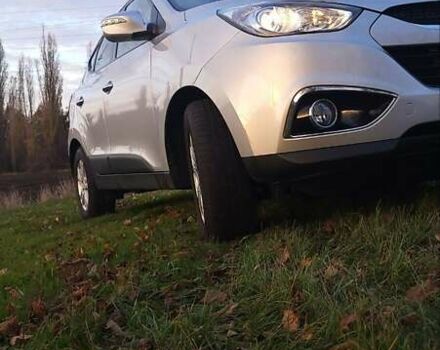 Сірий Хендай іх35, об'ємом двигуна 2 л та пробігом 208 тис. км за 14750 $, фото 22 на Automoto.ua