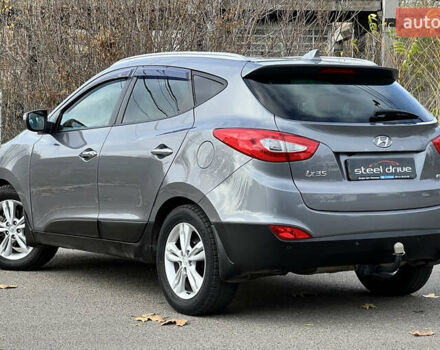 Сірий Хендай іх35, об'ємом двигуна 2 л та пробігом 178 тис. км за 11999 $, фото 3 на Automoto.ua