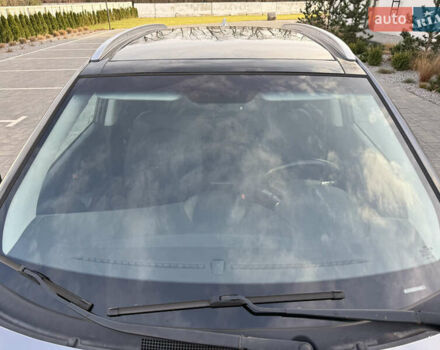 Сірий Хендай іх35, об'ємом двигуна 2 л та пробігом 124 тис. км за 16600 $, фото 7 на Automoto.ua