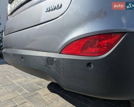 Сірий Хендай іх35, об'ємом двигуна 2 л та пробігом 113 тис. км за 16950 $, фото 26 на Automoto.ua
