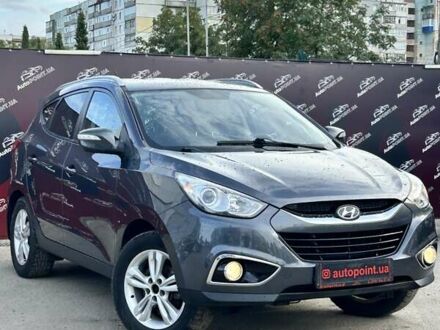 Сірий Хендай іх35, об'ємом двигуна 2 л та пробігом 237 тис. км за 11000 $, фото 1 на Automoto.ua