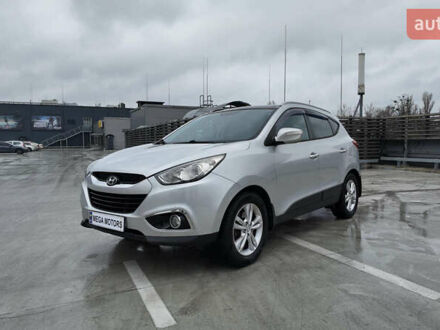 Сірий Хендай іх35, об'ємом двигуна 2 л та пробігом 174 тис. км за 13990 $, фото 1 на Automoto.ua