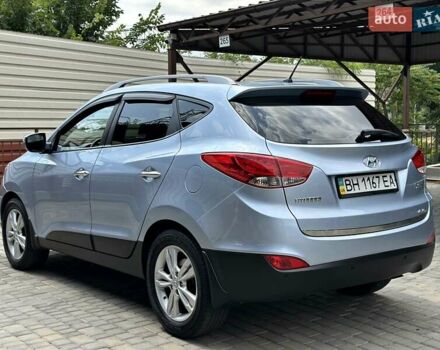 Синий Хендай их35, объемом двигателя 2 л и пробегом 105 тыс. км за 13300 $, фото 31 на Automoto.ua