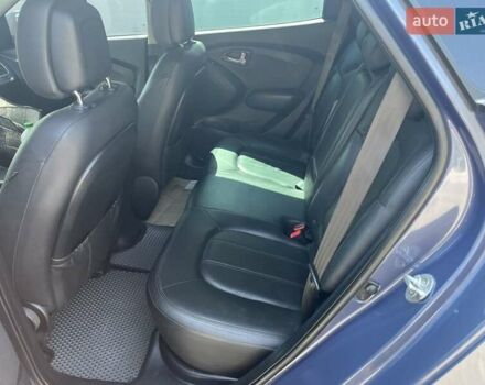 Синий Хендай их35, объемом двигателя 2 л и пробегом 133 тыс. км за 12399 $, фото 4 на Automoto.ua