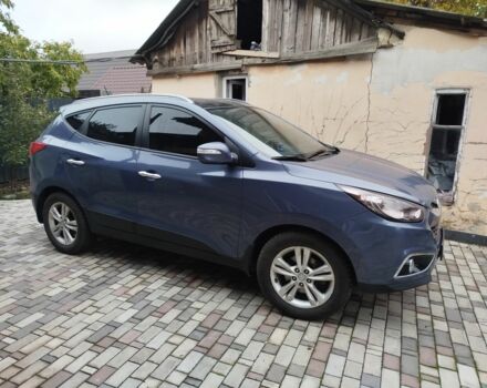 Синий Хендай их35, объемом двигателя 2 л и пробегом 200 тыс. км за 11000 $, фото 1 на Automoto.ua