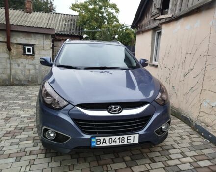 Синий Хендай их35, объемом двигателя 2 л и пробегом 200 тыс. км за 11000 $, фото 2 на Automoto.ua