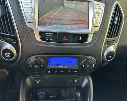 Синій Хендай іх35, об'ємом двигуна 2 л та пробігом 179 тис. км за 12999 $, фото 23 на Automoto.ua