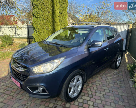 Синій Хендай іх35, об'ємом двигуна 2 л та пробігом 179 тис. км за 12999 $, фото 1 на Automoto.ua