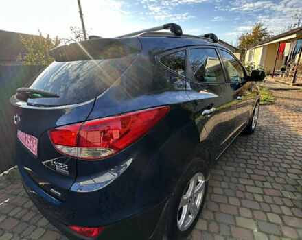 Синій Хендай іх35, об'ємом двигуна 2 л та пробігом 179 тис. км за 12999 $, фото 5 на Automoto.ua