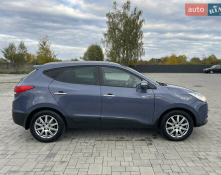 Синій Хендай іх35, об'ємом двигуна 2 л та пробігом 238 тис. км за 13300 $, фото 25 на Automoto.ua