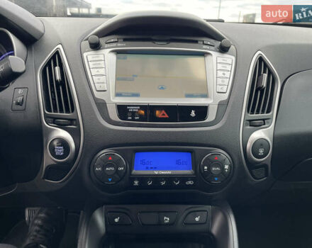 Синій Хендай іх35, об'ємом двигуна 2 л та пробігом 238 тис. км за 13300 $, фото 4 на Automoto.ua