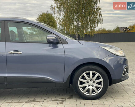 Синій Хендай іх35, об'ємом двигуна 2 л та пробігом 238 тис. км за 13300 $, фото 24 на Automoto.ua