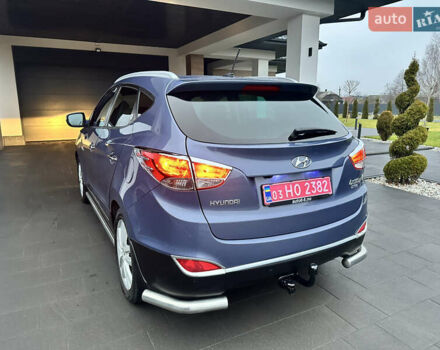 Синій Хендай іх35, об'ємом двигуна 1.7 л та пробігом 154 тис. км за 12700 $, фото 11 на Automoto.ua