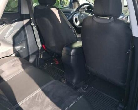 Синій Хендай іх35, об'ємом двигуна 2 л та пробігом 231 тис. км за 12800 $, фото 2 на Automoto.ua