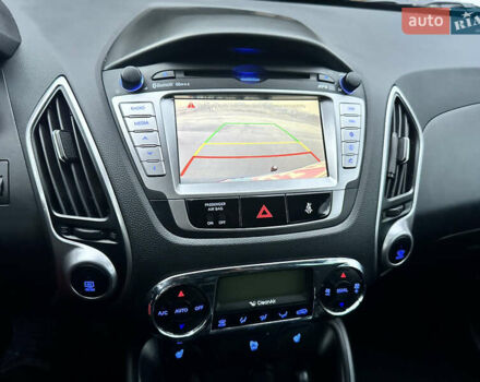 Синій Хендай іх35, об'ємом двигуна 1.7 л та пробігом 154 тис. км за 12700 $, фото 35 на Automoto.ua