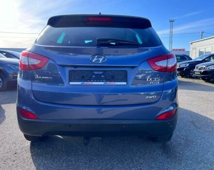 Синій Хендай іх35, об'ємом двигуна 2 л та пробігом 220 тис. км за 8500 $, фото 4 на Automoto.ua