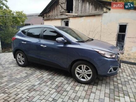 Синий Хендай их35, объемом двигателя 2 л и пробегом 200 тыс. км за 11000 $, фото 1 на Automoto.ua