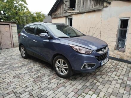 Синий Хендай их35, объемом двигателя 2 л и пробегом 200 тыс. км за 11000 $, фото 1 на Automoto.ua