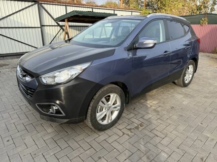 Синий Хендай их35, объемом двигателя 2 л и пробегом 175 тыс. км за 7200 $, фото 1 на Automoto.ua