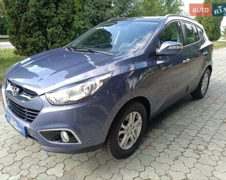 Синій Хендай іх35, об'ємом двигуна 2 л та пробігом 261 тис. км за 13350 $, фото 1 на Automoto.ua