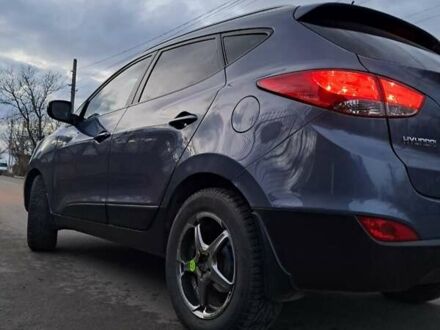 Синий Хендай их35, объемом двигателя 2 л и пробегом 231 тыс. км за 12800 $, фото 1 на Automoto.ua