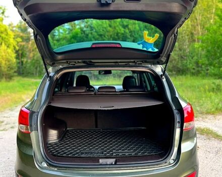 Зелений Хендай іх35, об'ємом двигуна 2 л та пробігом 115 тис. км за 11200 $, фото 6 на Automoto.ua