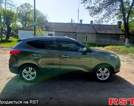 Зеленый Хендай их35, объемом двигателя 2 л и пробегом 178 тыс. км за 8500 $, фото 6 на Automoto.ua