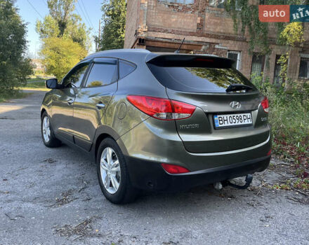 Зеленый Хендай их35, объемом двигателя 2 л и пробегом 186 тыс. км за 11000 $, фото 6 на Automoto.ua