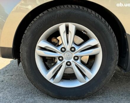 Зелений Хендай іх35, об'ємом двигуна 2 л та пробігом 246 тис. км за 10890 $, фото 7 на Automoto.ua