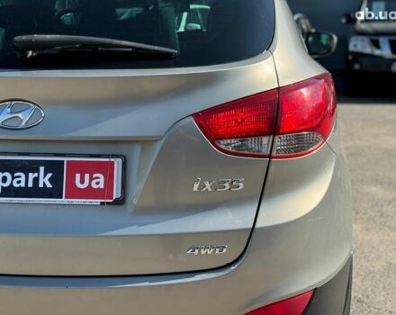 Зелений Хендай іх35, об'ємом двигуна 2 л та пробігом 246 тис. км за 10890 $, фото 12 на Automoto.ua