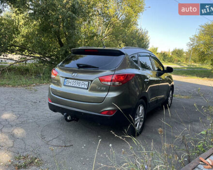 Зеленый Хендай их35, объемом двигателя 2 л и пробегом 186 тыс. км за 11000 $, фото 4 на Automoto.ua