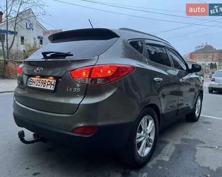 Зеленый Хендай их35, объемом двигателя 2 л и пробегом 187 тыс. км за 10999 $, фото 3 на Automoto.ua