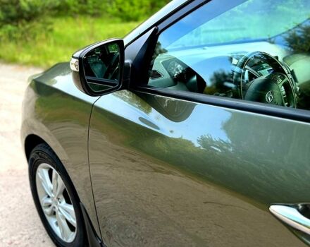 Зелений Хендай іх35, об'ємом двигуна 2 л та пробігом 115 тис. км за 11200 $, фото 7 на Automoto.ua