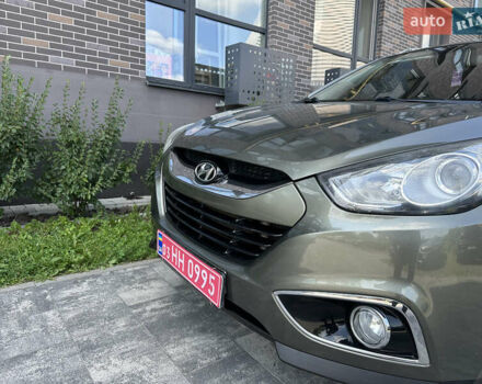 Зелений Хендай іх35, об'ємом двигуна 2 л та пробігом 212 тис. км за 13650 $, фото 9 на Automoto.ua
