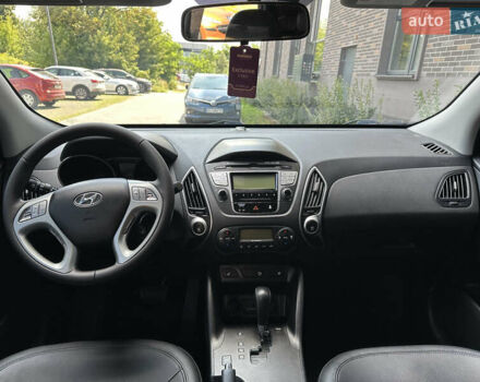 Зелений Хендай іх35, об'ємом двигуна 2 л та пробігом 212 тис. км за 13650 $, фото 14 на Automoto.ua