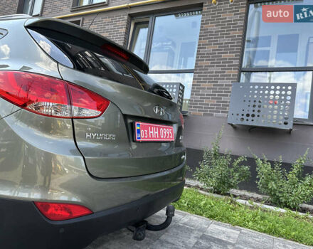 Зелений Хендай іх35, об'ємом двигуна 2 л та пробігом 212 тис. км за 13650 $, фото 8 на Automoto.ua