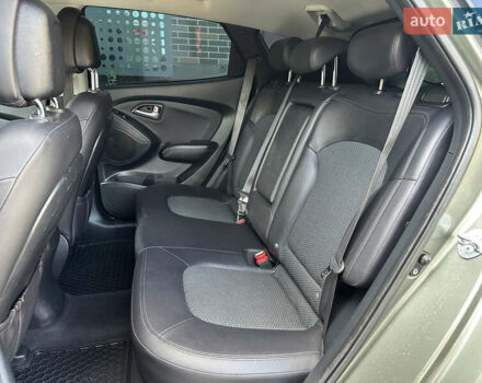Зелений Хендай іх35, об'ємом двигуна 2 л та пробігом 212 тис. км за 13650 $, фото 18 на Automoto.ua