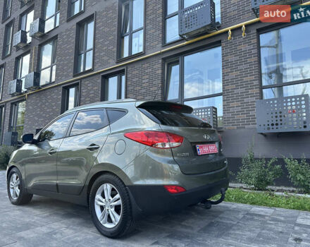 Зелений Хендай іх35, об'ємом двигуна 2 л та пробігом 212 тис. км за 13650 $, фото 3 на Automoto.ua