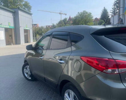 Зелений Хендай іх35, об'ємом двигуна 1.7 л та пробігом 290 тис. км за 11000 $, фото 5 на Automoto.ua