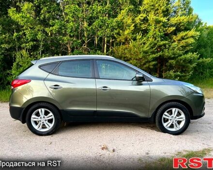 Зеленый Хендай их35, объемом двигателя 2 л и пробегом 115 тыс. км за 11200 $, фото 1 на Automoto.ua