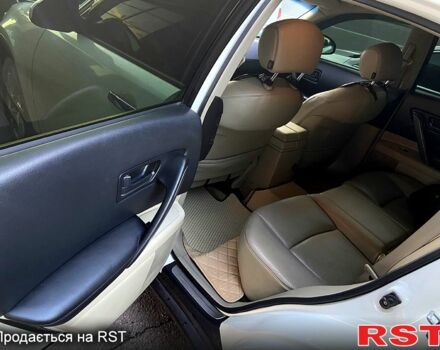 Белый Инфинити ФХ, объемом двигателя 3.5 л и пробегом 280 тыс. км за 9850 $, фото 4 на Automoto.ua