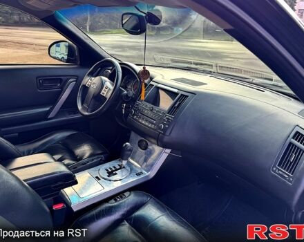 Черный Инфинити ФХ, объемом двигателя 3.5 л и пробегом 180 тыс. км за 7000 $, фото 5 на Automoto.ua