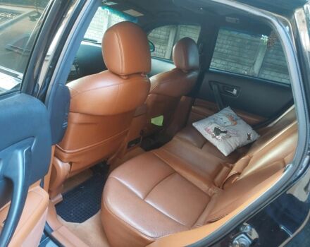 Черный Инфинити ФХ, объемом двигателя 3.5 л и пробегом 172 тыс. км за 9500 $, фото 5 на Automoto.ua