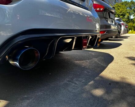 Белый Инфинити Q50, объемом двигателя 3.7 л и пробегом 129 тыс. км за 14000 $, фото 2 на Automoto.ua