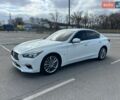 Белый Инфинити Q50, объемом двигателя 3 л и пробегом 145 тыс. км за 10999 $, фото 1 на Automoto.ua