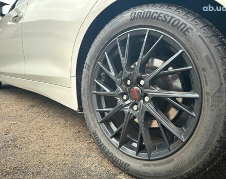 Белый Инфинити Q50, объемом двигателя 3 л и пробегом 143 тыс. км за 14200 $, фото 14 на Automoto.ua