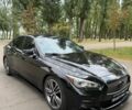 Черный Инфинити Q50, объемом двигателя 3.7 л и пробегом 228 тыс. км за 15000 $, фото 1 на Automoto.ua